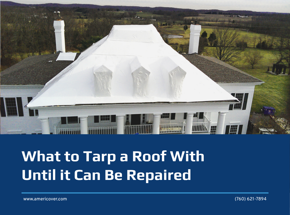 White heat shrink wrap covering the roof of a two-story colonial home, with the blog title What to Tarp a Roof With Until it Can Be Repaired