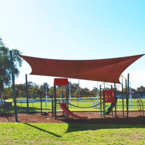 Red Shade Cloth on a Playground