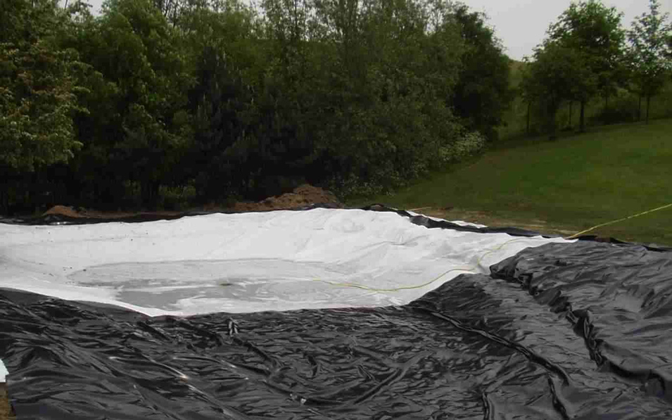 Environmental remediation liner covering contaminated soil